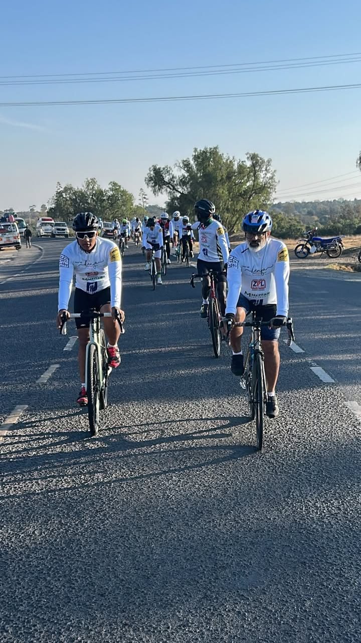 Two riders training together on the open road